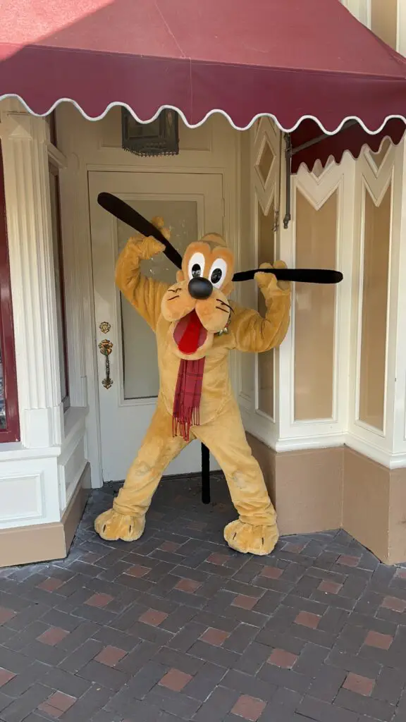 Mickey Mouse and Friends Debut New Costumes for the Holidays at Disneyland Park - Pluto